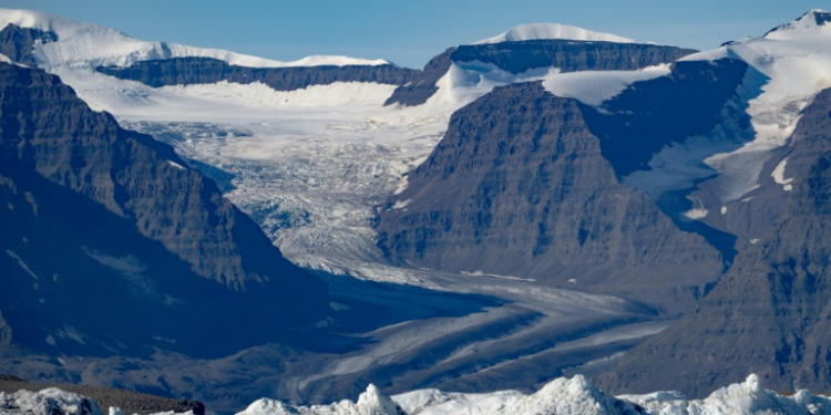 A photograph taken in Scoresby Fjord, Estarn Greenland shows a partly melted glacier. ©AFP