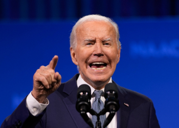 US President Joe Biden speaks during the 115th NAACP National Convention / ©AFP