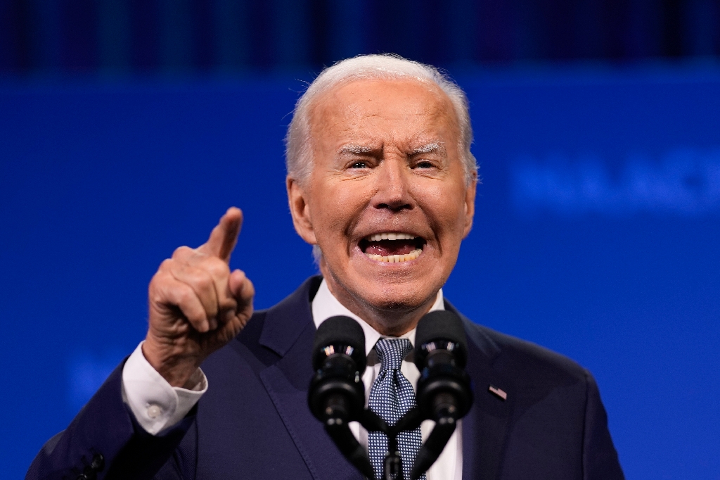 US President Joe Biden speaks during the 115th NAACP National Convention / ©AFP