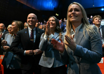 The Salt Lake City delegation including former skier Lindsey Vonn celebrate being awarded the 2034 Winter Olympics. ©AFP