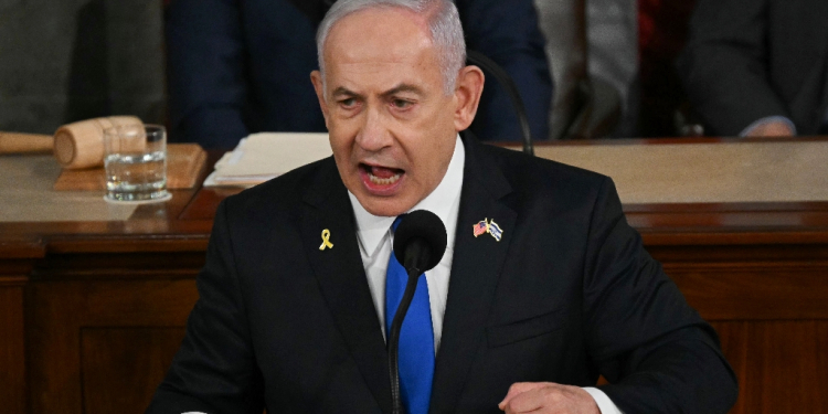 Israeli Prime Minister Benjamin Netanyahu addresses a joint meeting of Congress at the US Capitol on July 24, 2024 / ©AFP