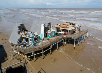 An aerial view shows a destroyed waterfront home in Surfside Beach, Texas, after Hurricane Beryl made landfall. ©AFP