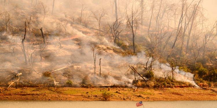 An out-of-control fire in northern California has promoted warnings for thousands of people to flee. ©AFP