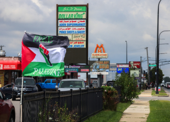 Palestinian flags flutter in the wind, shops display signs in both Arabic and English, and posters call for demonstrations against steadfast US military support of Israel  / ©AFP