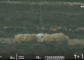 The capsule reentered the atmosphere, deployed its parachutes and landed in the desert with a puff of sand. ©AFP