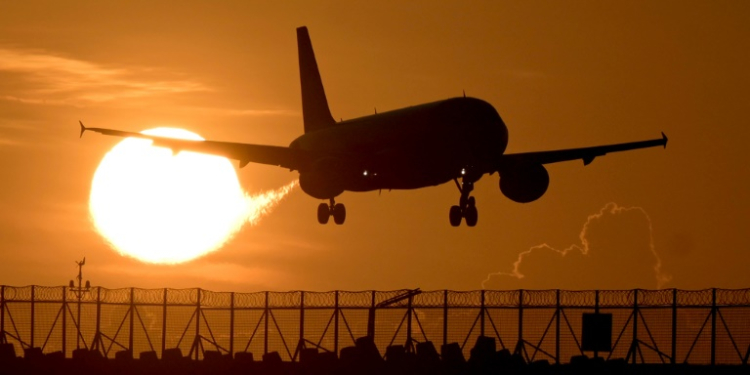 A commercial plane prepares to land at Ngurah Rai international airport in Denpasar, on Indonesia's Bali island . ©AFP