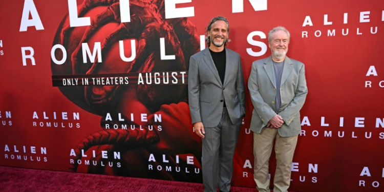 Uruguayan filmmaker Fede Alvarez (L) directed the latest film in the series, whose first film was made by British filmmaker Ridley Scott (R). ©AFP