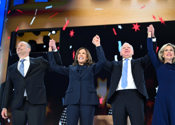 Kamala Harris, pictured here with running mate Tim Walz and their spouses at the Democratic National Convention, has been under pressure to do a media interview since launching her campaign last month / ©AFP