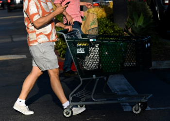 The US personal consumption expenditures price index held firm at 2.5 percent from a year ago in July. ©AFP