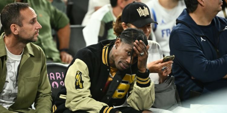 Travis Scott was seen attending the Olympics men's basketball semi-finals on Thursday evening. ©AFP