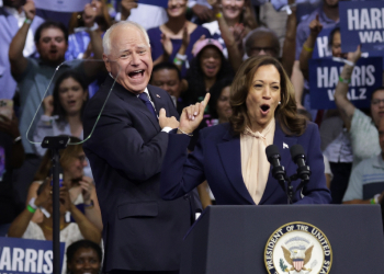 Tim Walz is seen as a happy warrior who boosts a ticket along side Vice President Kamala Harris that is seeking to project optimism / ©AFP