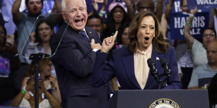 Tim Walz is seen as a happy warrior who boosts a ticket along side Vice President Kamala Harris that is seeking to project optimism / ©AFP