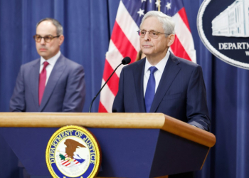 US Attorney General Merrick Garland speaks alongside Assistant Attorney General Jonathan Kanter to unveil charges against RealPage. ©AFP