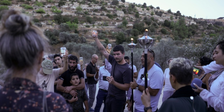 Activists try to reach a land confiscated by Israeli settlers in the al-Makhrur area, near Beit Jala in the Israeli occupied West Bank, on August 15, 2024. ©AFP