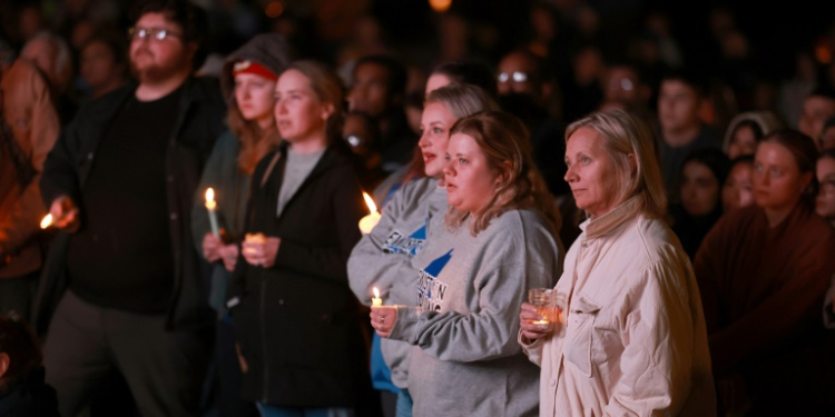 A memorial ceremony in Lewiston, Maine, for victims of the mass shooting that left 18 people dead. ©AFP