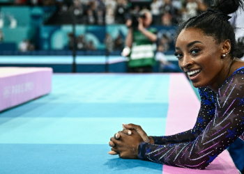 Simone Biles, with two Paris Olympics gold medals and counting, has cemented her legacy as the greatest gymnast of all time  / ©AFP