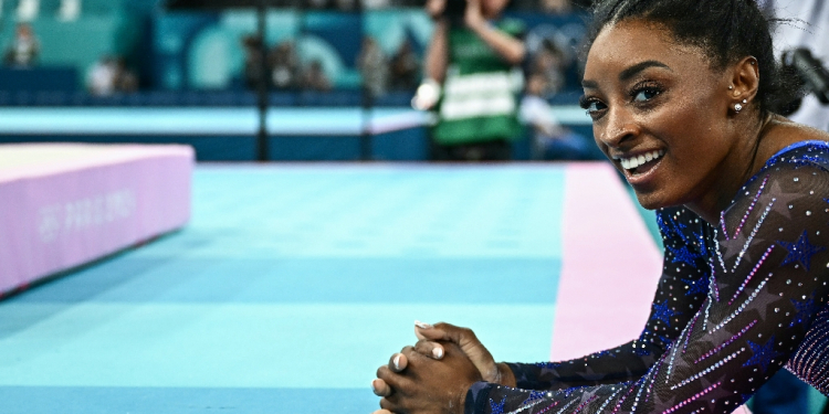 Simone Biles, with two Paris Olympics gold medals and counting, has cemented her legacy as the greatest gymnast of all time  / ©AFP