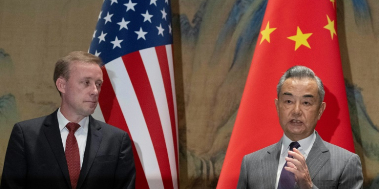 China's Foreign Minister Wang Yi (R) speaks as US National Security Advisor Jake Sullivan looks on before talks at Yanqi Lake in Beijing on August 27, 2024.. ©AFP