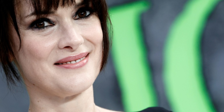 Actor Winona Ryder, who also starred in the original 'Beetlejuice,' poses on the red carpet at the London premiere of Tim Burton followup 'Beetlejuice Beetlejuice' on August 29, 2024. ©AFP