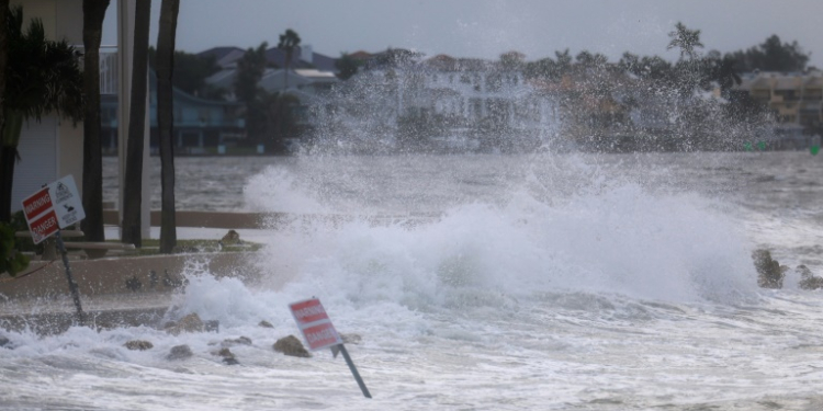 Waves crash onto St. Pete Beach, Florida as Hurricane Helene churns offshore on September 26, 2024. ©AFP