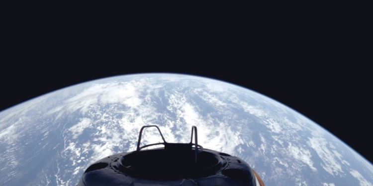 This handout image released by SpaceX on September 10, 2024 shows a view of Earth and the Dragon capsule's Skywalker shortly after the Polaris Dawn crew launched into orbit. ©AFP