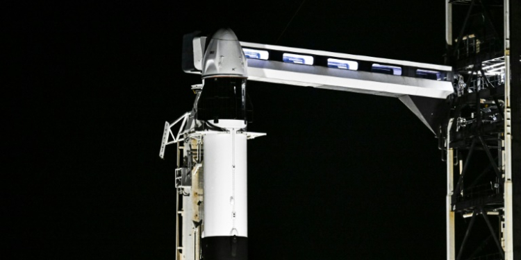 A SpaceX Falcon 9 rocket with the Crew Dragon Resilience capsule sits on Launch Complex 39A at Kennedy Space Center ahead of the Polaris Dawn Mission in Cape Canaveral, Florida, on August 28, 2024. ©AFP