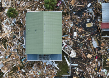 An aerial view shows damaged houses in Horseshoe Beach, Florida, on September 28, 2024 after the passage of Hurricane Helene . ©AFP