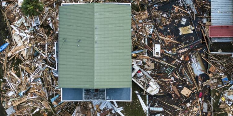 An aerial view shows damaged houses in Horseshoe Beach, Florida, on September 28, 2024 after the passage of Hurricane Helene . ©AFP