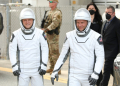 US astronaut Nick Hague (R) and Russian cosmonaut Alexander Gorbunov head to a Kennedy Space Center launch pad in Florida. ©AFP