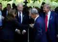 Kamala Harris shakes hands with  Donald Trump during a remembrance ceremony on the 23rd anniversary of the September 11 terror attack . ©AFP