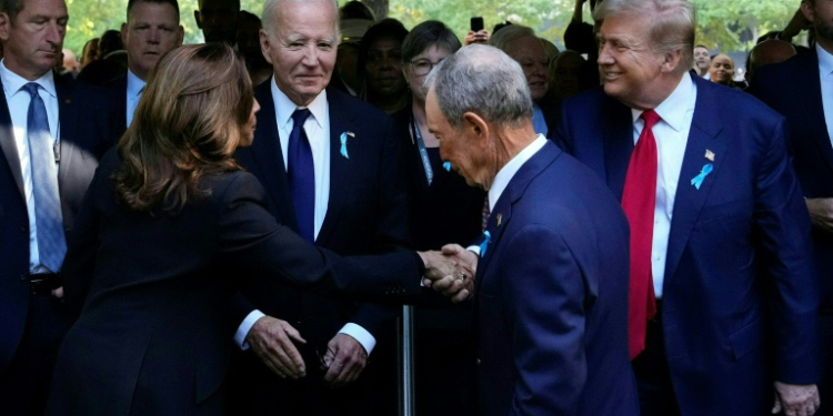 Kamala Harris shakes hands with  Donald Trump during a remembrance ceremony on the 23rd anniversary of the September 11 terror attack . ©AFP