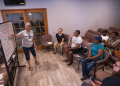 Volunteer teacher Hope Kaufman leads Haitian students during an English language class at the Haitian Community Help and Support Center in Springfield, Ohio. ©AFP