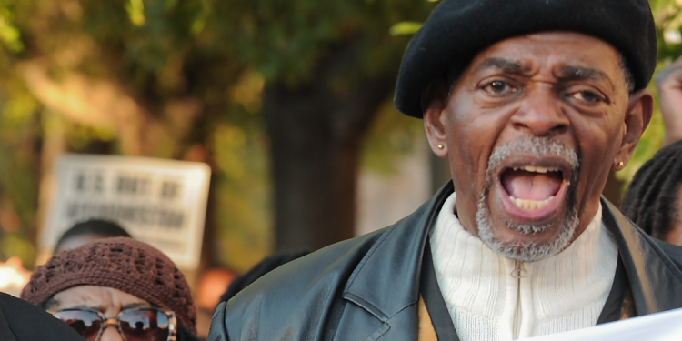 Black rights activist Omali Yeshitela, seen at a White House protest in November 2009, was convicted of conspiring to act as an unregistered Russian agent / ©AFP