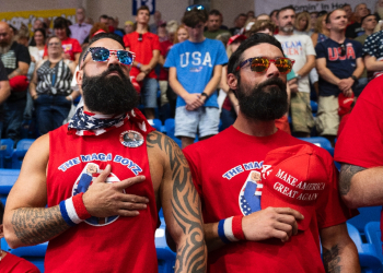 Nick Passano (L), a cryptocurrency investor, says he likes Donald Trump because he represents men / ©AFP