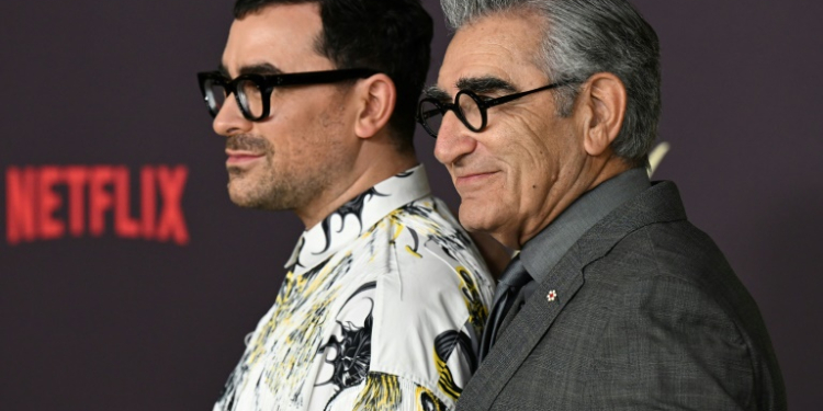 Father-and-son acting duo Dan (L) and Eugene Levy (R) will host the 76th Emmy Awards ceremony. ©AFP