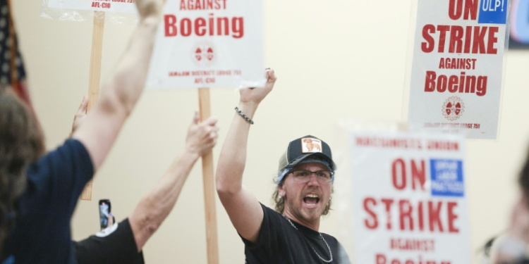 Boeing workers in the Seattle region overwhelmingly voted to strike and reject a contract . ©AFP