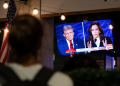 A screen displaying the US Presidential debate between Vice President and Democratic presidential candidate Kamala Harris and former US President and Republican presidential candidate Donald Trump  / ©AFP