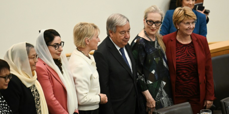 American actor Meryl Streep (2nd from R) stands next to UN Secretary-General Antonio Guterres (C) at an event on the sidelines of the UN General Assembly. ©AFP