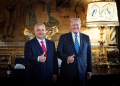 In this handout photograph taken and released by the Hungarian Prime Minister's Office on July 11, 2024, Hungary's Prime Minister Viktor Orban (L) poses with former US president Donald Trump at Trump's estate in Mar-a-Lago in Palm Beach, Florida / ©AFP