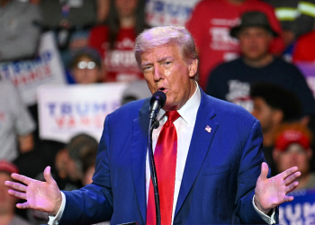 Former US president Donald Trump ramped up attacks on rival Kamala Harris during a campaign rally in Pennsylvania, claiming she is unleashing a 'flood' of migrants into the state's cities and towns / ©AFP