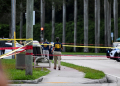 Members of FBI are seen at the crime scene outside the Trump International Golf Club in West Palm Beach, Florida / ©AFP