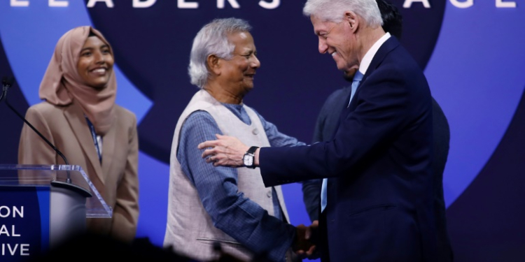 Bangladesh's interim leader Muhammad Yunus received high praise from former president Bill Clinton, who hailed their 40-year-long friendship and the global impact of the Bangladeshi's pioneering microfinance loans . ©AFP