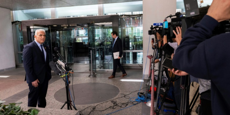 Israel's opposition leader and former prime minister Yair Lapid delivers a statement to the press following his meeting with US Secretary of State Antony Blinken at the State Department. ©AFP