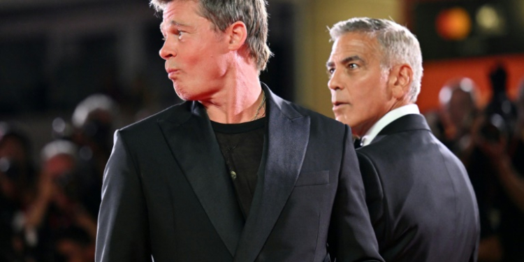 Clooney (R) said it felt second nature sparring with Pitt (L) in the action comedy. ©AFP