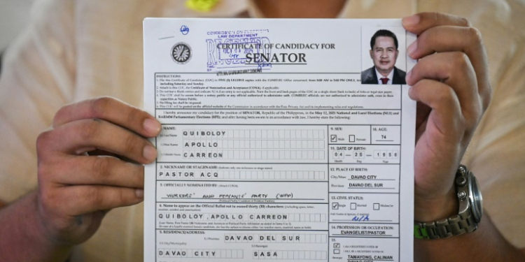 Apollo Quiboloy, a detained Philippine pastor also wanted in the United States for sex trafficking children, registered Tuesday to run in next year's senate elections. ©AFP