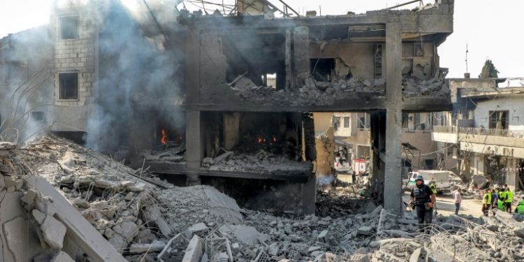 A building destroyed by an Israeli air strike on the village of Qana in southern Lebanon . ©AFP