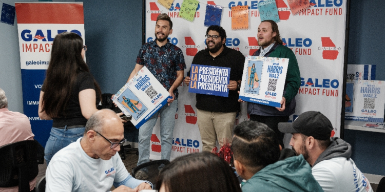 Staff and volunteers gather at the office of the Galeo Impact Fund, a voter outreach organisation, outside Atlanta / ©AFP