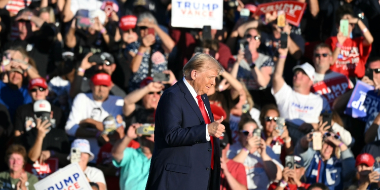 Republican presidential candidate Donald Trump takes the stage at a campaign rally at the site of his first assassination attempt in Butler, Pennsylvania / ©AFP