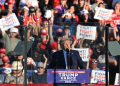 Republican presidential candidate Donald Trump addressed the rally in Butler, Pennsylvania from behind bulletproof glass amid security concerns following two assassination attempts  / ©AFP