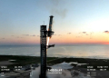 This still image taken from a SpaceX broadcast shows the Starship's Super Heavy Booster being 'caught' mid-air as it returns to the launch pad near Boca Chica, Texas. ©AFP